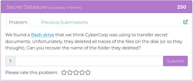 We found a flash drive that we think CyberCorp was using to transfer secret documents. Unfortunately, they deleted all traces of the files on the disk (or so they thought). Can you recover the name of the folder they deleted?