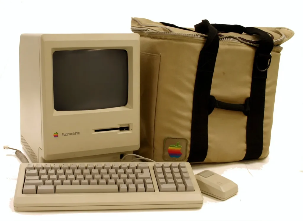 A vintage Mac Plus computer.