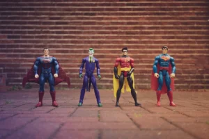 A group of superhero toys.